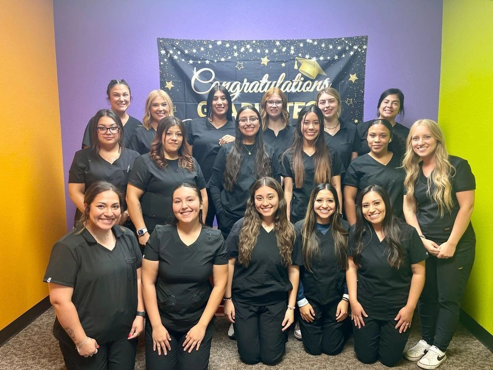 Medical assistants posing for picture at graduation